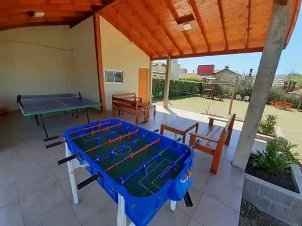 Club house con ping pong, metegol y vista al parque