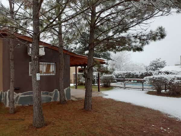 Cabañas en Los Reartes durante una nevada